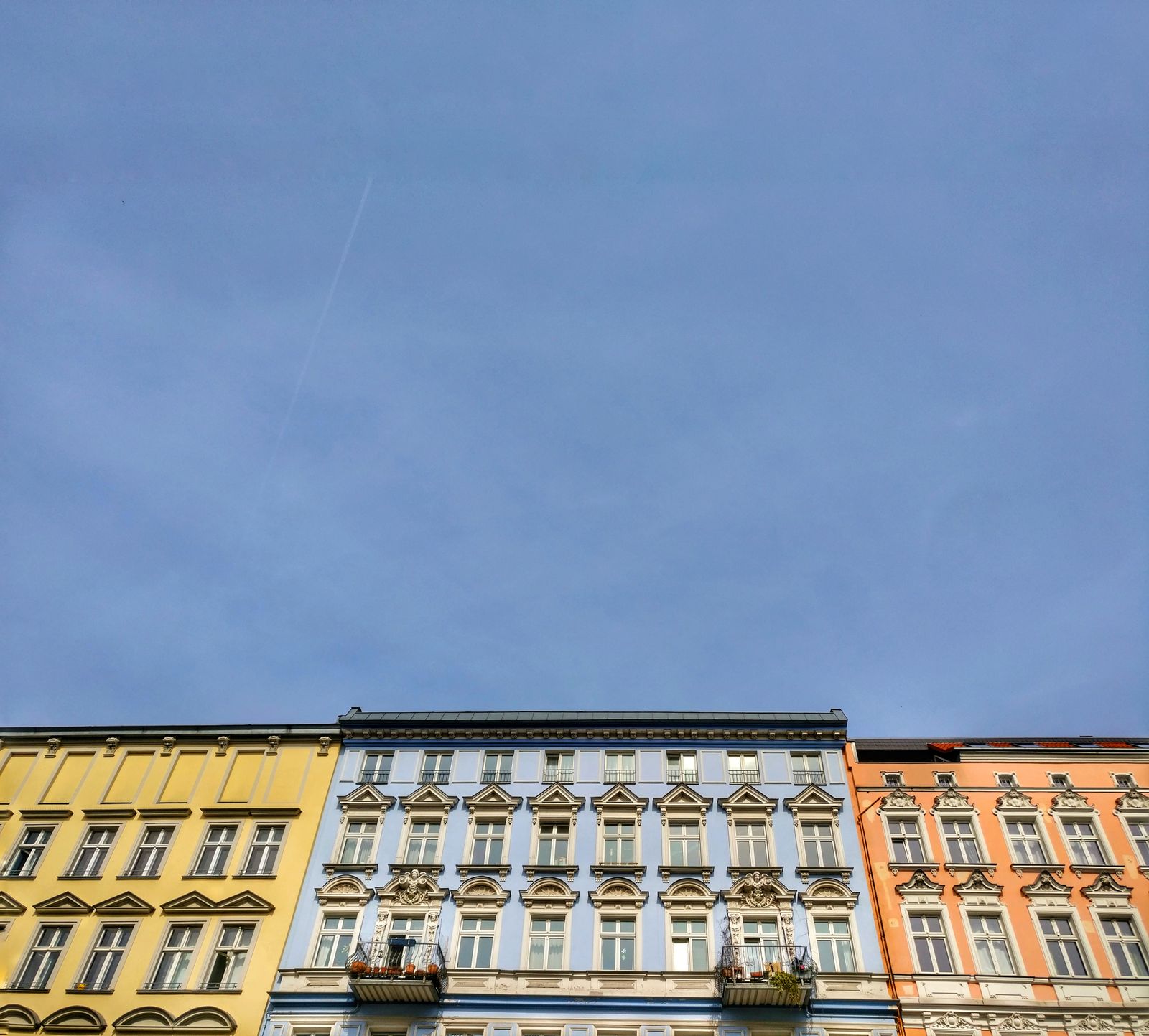 https://www.pexels.com/photo/assorted-color-commercial-buildings-under-cloudy-sky-543610/